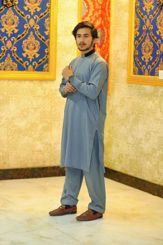 modern style grey color kameez shalwar with black collar.