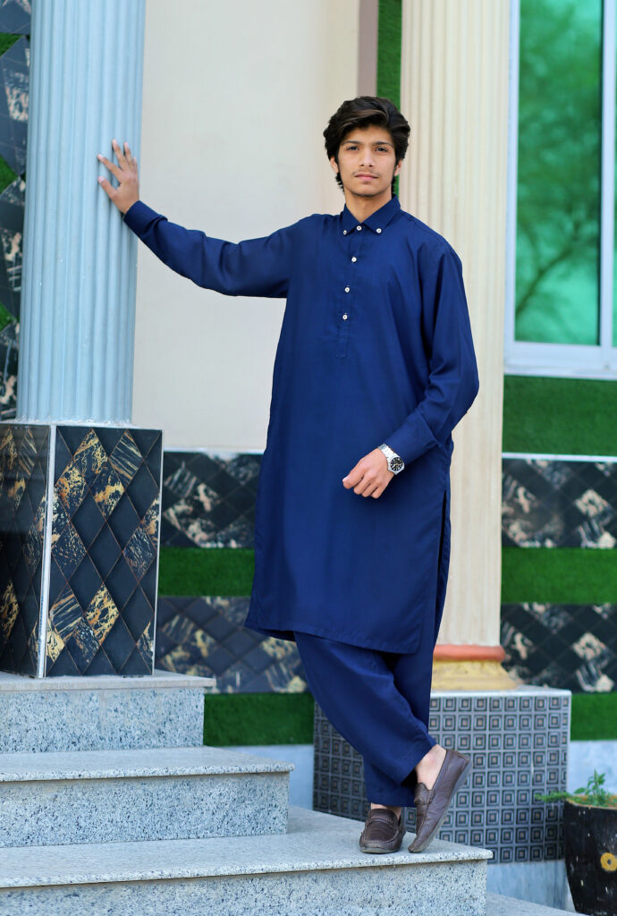 modern stitched kameez shalwar in dark blue color with royal golden buttons